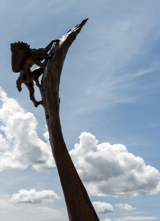 Mesa Verde National Park, United States: June 7, 2023: Statue of Pueblo Man Climbing outside modern visitor centerの写真素材