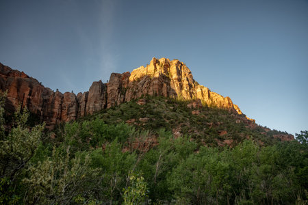 Sun Warms The Cliffs Of Kolob Canyon in Zion National Parkの写真素材