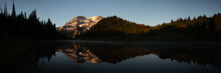 Panorama Of Late Evening Shadows and Light Over Klapatche Park in Mount Rainier National Parkの写真素材