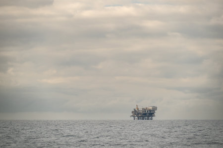 Oil Rig Against A Cloudy Sky Off The Coast of Ventura, Californiaの写真素材