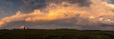 Yellow And Orange Stroke Of Light Crosses The Sky Over Hayden Valley In Yellowstone National Park