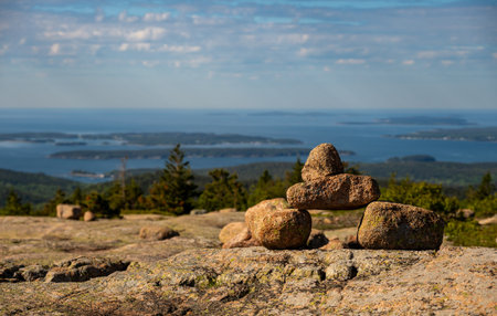 Balanced Rocks of A Bates Cairn Sits On The Open Rocks Of Cadillac Mountain in Acadia National Parkの写真素材