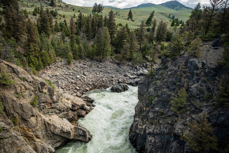Hellroaring Creek Rushes Deep Below The Suspension Bridge in Yellowstone National Parkの写真素材