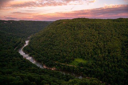 Pink Sunset Light Over New River from the Endless Wall Trail in Summerの写真素材