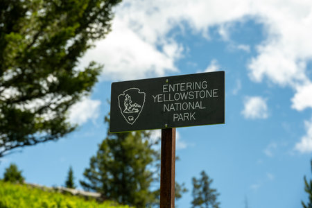 Entering Sign On The Border Of Yellowstone National Parkの写真素材