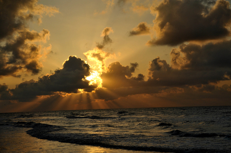 Sunrise in Surfside Texas Beachの写真素材