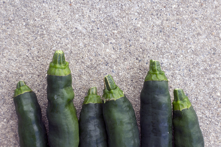 Green Chilies on Concrete Closeupの写真素材