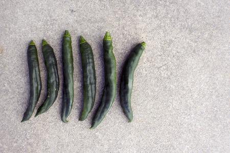 Green Chilies on Concreteの写真素材