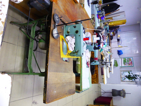 Seamstress at work in a sewing studioの写真素材