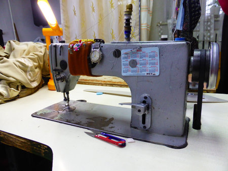 Seamstress at work in a sewing studioの写真素材