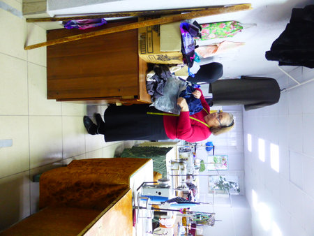 Seamstress at work in a sewing studioの写真素材