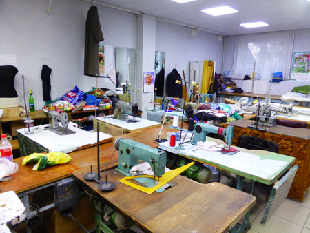 Seamstress at work in a sewing studioの写真素材