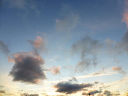 The sky is blue, clouds at sunsetの写真素材