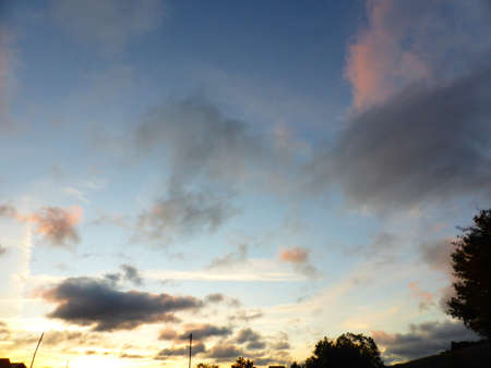 The sky is blue, clouds at sunsetの写真素材