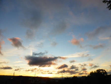 The sky is blue, clouds at sunsetの写真素材
