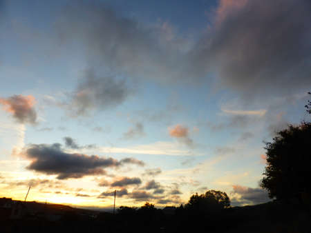 The sky is blue, clouds at sunsetの写真素材