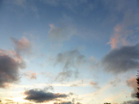 The sky is blue, clouds at sunsetの写真素材