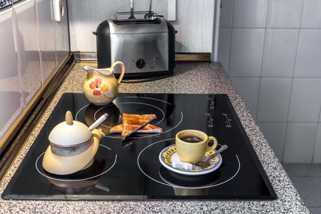 breakfast with coffee and toast  ready to eat in the kitchenの写真素材