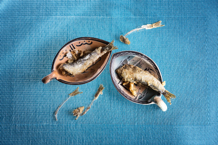 Appetizer fried sardines and fishbone. Mediterranean foodの写真素材