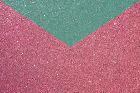 litlle flashes on pink and green  envelope card.background with rough texture