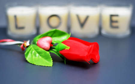 love candles with rose bokehの写真素材