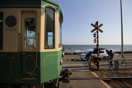 KAMAKURA, JAPAN - June 4: Enoden Line in Kamakura, Japan on June 4, 2015. Enoshima Electric Railway, has 100 years of history, links the central Shonan area, Kamakura and Fujisawa.のeditorial素材