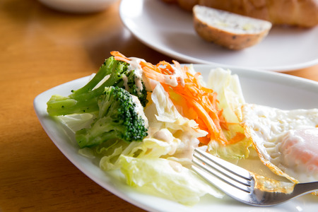 Croissant and yoghurt and egg & saladの写真素材