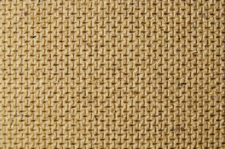 .Background. Perforated particle wooden board texture.