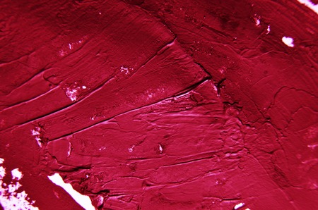Red, crimson, magenta background. Smears of oil paint on white background. Grunge texture, fresh...
