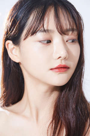 Beauty concept portrait of young Asian woman with soft highlights.の写真素材