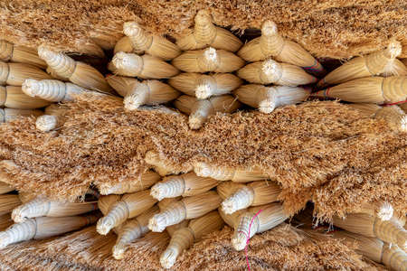 Close up of a bundle of straw for sale at a market stallの写真素材
