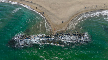 Aerial view of the beach in the city of Nazare, Portugalの写真素材