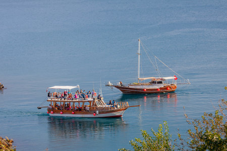 <p>Antalya, Turkey, October 8, 2010: Enjoying a holiday with motorboats and sailboats in the south...