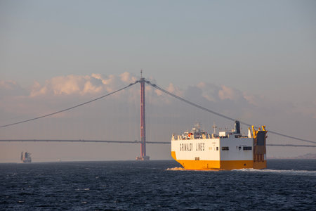 Canakkale, Turkey, December 25, 2021: Ship passing through Ãanakkale Bridge and Ãanakkale Straitのeditorial素材