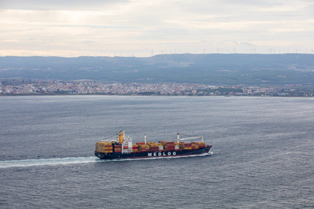 Canakkale, Turkey, December 25, 2021: Ship passing through Canakkale Strait