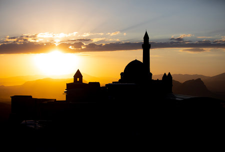 Silhouette of mosque at sunset.の写真素材