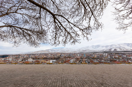 Empty square floor and snow covered mountains in Tbilisi, Georgiaの写真素材
