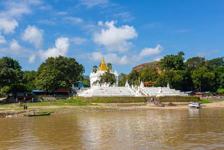 Buddhist temple on the banks of the Mekong River in Laosの写真素材