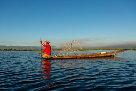 Fisherman on Inle Lake in Shan State in Myanmar in Southeastasia.の写真素材