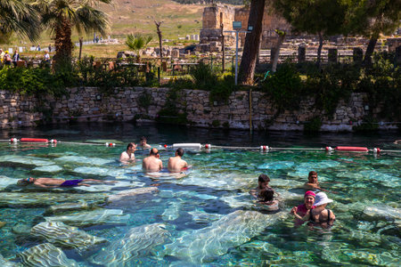 Unidentified people swimming in the pool at Ephesus, Turkeyの写真素材
