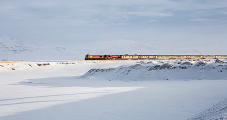 Freight train on the frozen lake in winter, Iceland, Europeの写真素材
