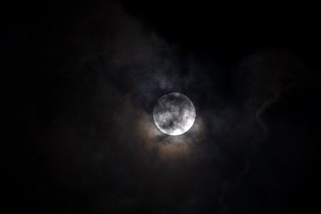 Full moon in the night sky with clouds and smoke. 3D Rendering