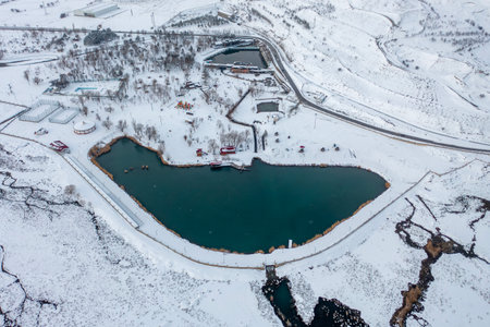 Aerial view of frozen lake in winter.