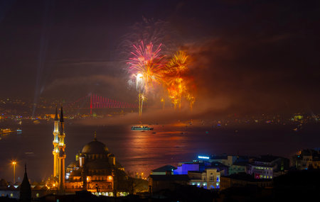 Fireworks over Galata Bridge and Suleymaniye Mosque at night, Istanbul, Turkey