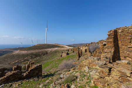 Wind turbines on the hillside in a sunny day, Spain.