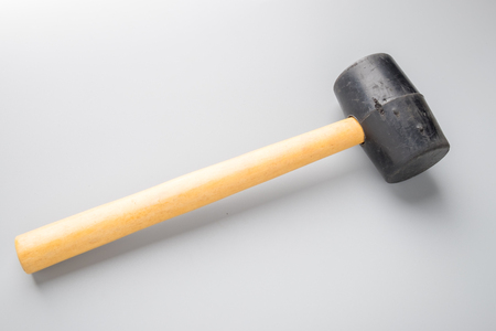 Rubber hammer on grey backgroundの写真素材