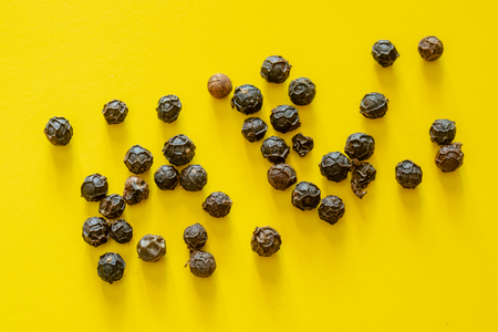 Black pepper corns closeupの写真素材