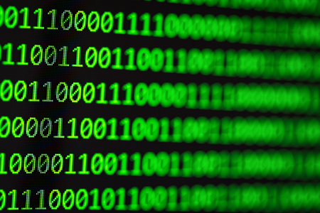 Hacker concept. computer binary codes.Green text on black background.の写真素材