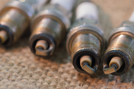 Auto service,Close up of dirty spark plugs.の写真素材