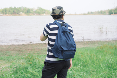 Young tourist enjoying the view of lagoon.の写真素材